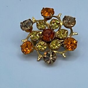 Vintage yellow, peach amber cut glass crystal brooch.